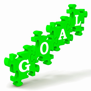 Goal Puzzle Shows Business Targets, Objectives And Aims
